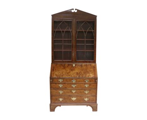 A George III Mahogany Bureau Bookcase, late 18th century, the associated upper section with an architectural pediment above l