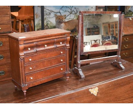 A Victorian Mahogany Apprentice Scotch Chest, with bone drawer pulls; together with a mahogany toilet mirror, with barley twi