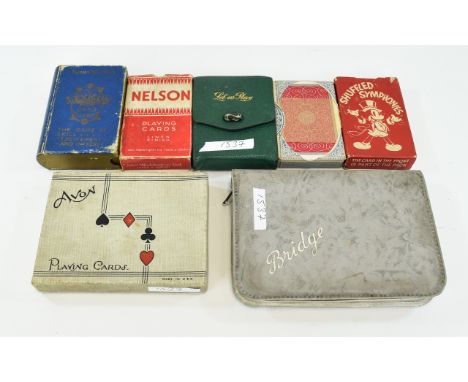 Vintage Card Games A collection of seven card sets, to include vintage Disney 'Shuffled Symponies' Avon playing cards, bridge