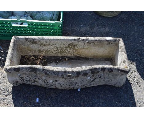Concrete serpentine formed planter