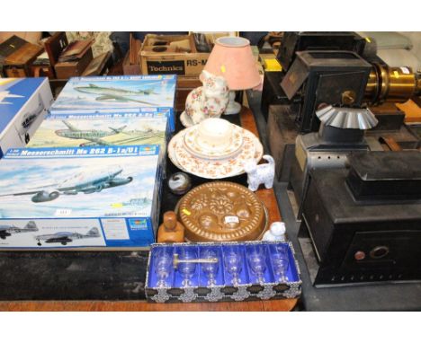 A copper jelly mould, a  boxed set of glasses, various plates, floral decorated cat ornament, an alabaster table lamp and sha