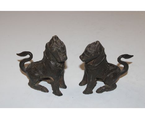 Two Oriental bronze Temple Dogs 