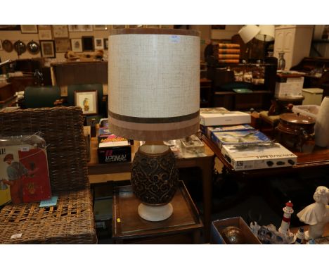 A pottery table lamp and shade 