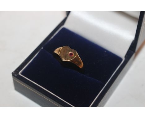 A 9ct gold ring of heart shape set with coloured stone, ring size N, approx. total weight 2.2gms