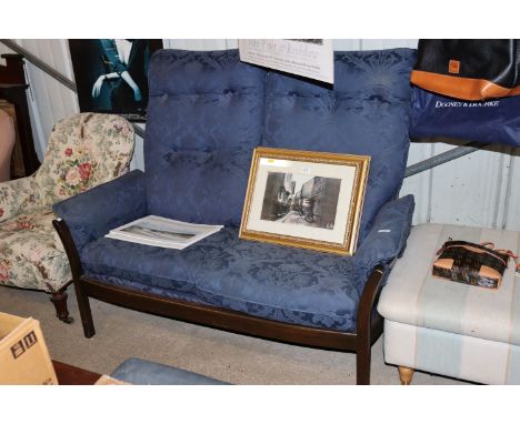 An Ercol two seater sofa