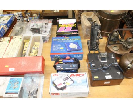 A Li Pro balance charge; a Bachmann train control system; a Ranger Modular locomotive system; 2 channel RC kit; Mac2002 charg