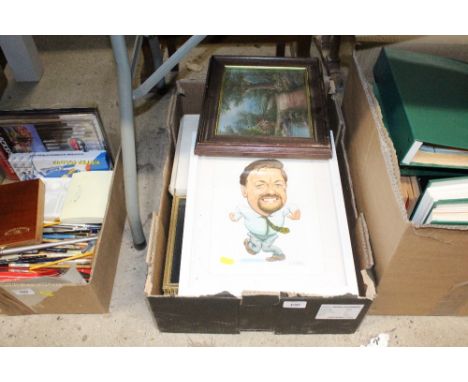 A box of various pictures and prints 