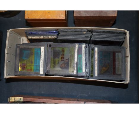 A box of advertising Magic Lantern slides 