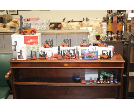 A quantity of Linde model fork lift - some with original boxes and a small quantity of die-cast vehicles 