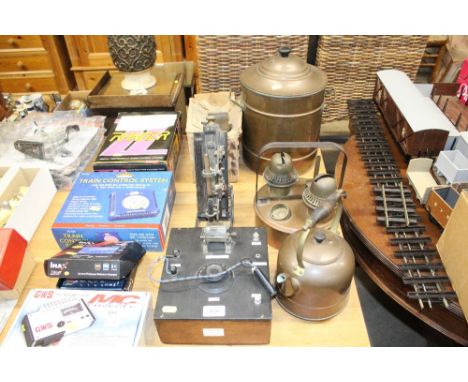 A crystal radio and a blow lamp; a copper urn, copper kettle etc. 