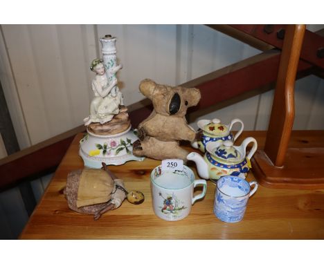 A Continental porcelain lamp base; two Continental porcelain teapots; a blue and white willow pattern coffee can; another dec