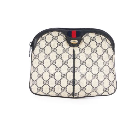 Gucci, an Accessory Collection Supreme handbag, designed with the maker's monogram coated canvas exterior and blue leather tr