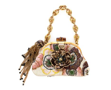 Gucci, a small sequin embellished bamboo purse, featuring a floral sequin embellished exterior, with gold-tone hardware, a pu