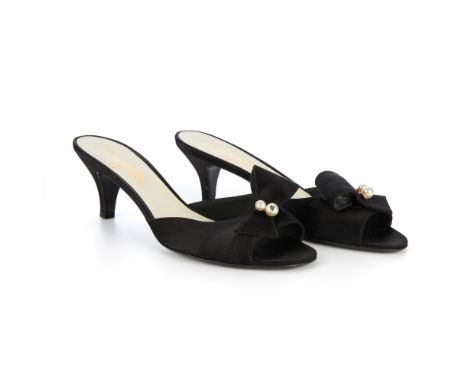 Chanel, a pair of black satin kitten heels, featuring a front bow with pearl detailing, labelled Chanel, size 39 (UK 6), with