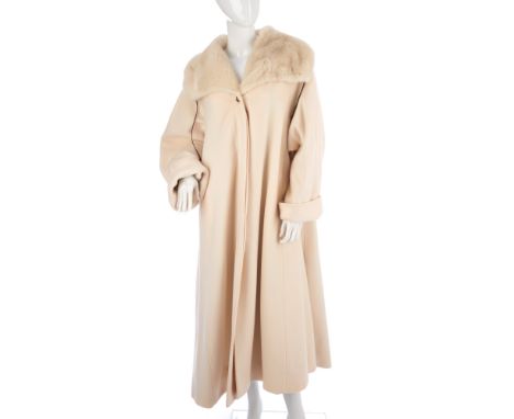A ladies full-length wool/cashmere cream coat with mink trim, featuring front button fastenings and a wide pearl mink collar,