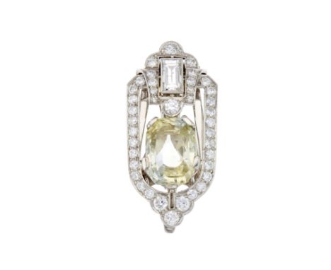 An Art Deco 14ct gold cushion-shape yellow sapphire and vari-cut diamond openwork clip brooch, sapphire estimated weight 10ct