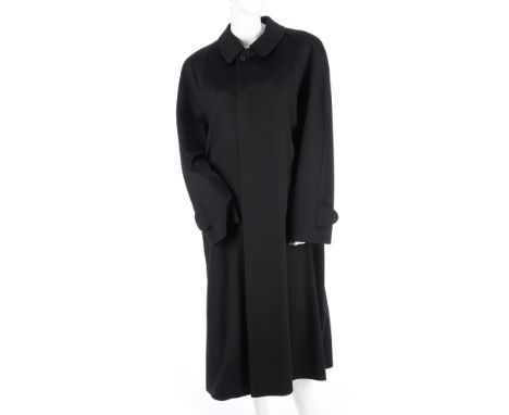 A gentlemen's black cashmere coat, with front button fastening, two outer pockets and an inner side zip pocket, labelled Schn