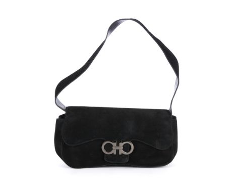 Salvatore Ferragamo, a Gancini handbag, designed with a black suede exterior, single leather shoulder strap, polished gunmeta
