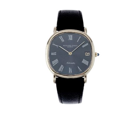 Audemars Piguet, an 18ct gold wrist watch, blue dial, signed automatic movement calibre 2121, numbered 142246, case back numb