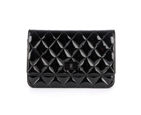 Chanel, a 2.55 Reissue Wallet On Chain handbag, crafted from diamond quilted black patent leather, featuring the maker's Made