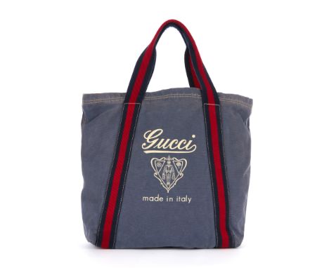 Gucci, a Logo Web shopping tote, crafted from blue canvas, featuring the maker's printed logo to the centre front, with blue 