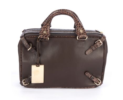 Celine, a brown leather satchel, crafted from smooth brown leather with crocodile embossed leather trim, featuring polished g