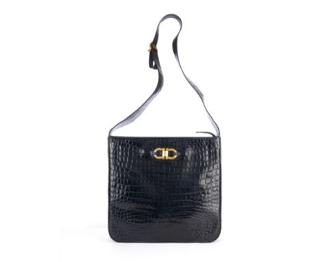 Salvatore Ferragamo, an embossed Gancini handbag, designed with a black crocodile embossed leather exterior, with a gold-tone