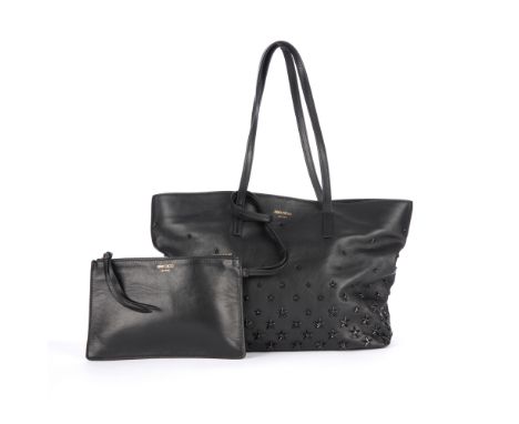 Jimmy Choo, a Star Studded tote with pouch, crafted from smooth black leather, featuring black metal star-shaped studs to the