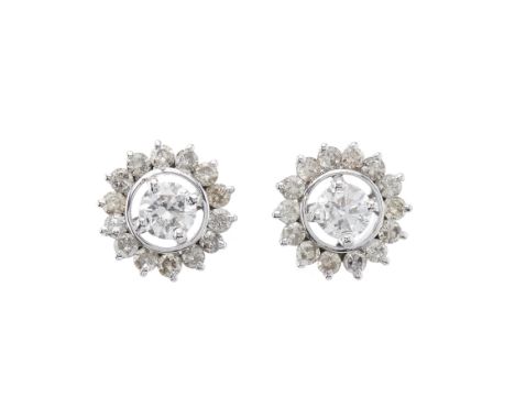 A pair of brilliant-cut diamond single-stone stud earrings, with similarly-cut diamond halo, estimated total diamond weight 2