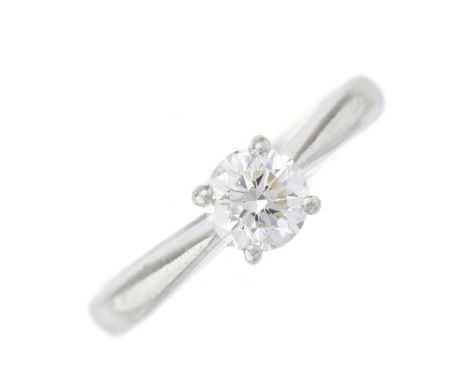 A platinum brilliant-cut diamond single-stone ring, with slightly tapered shoulders, diamond estimated weight 0.55ct, J-K col