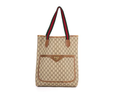 Gucci, a GG Plus Supreme tote, crafted from the maker's GG Plus coated canvas, featuring a front patch pocket, an open top an
