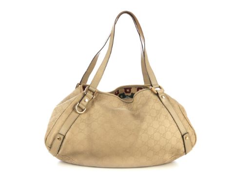 Gucci, a Guccissima Diagonal Abbey tote, designed with the maker's cream monogram embossed leather exterior, with pale gold-t