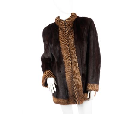 A ladies ranch mink jacket with two-tone trim, featuring a short Mandarin collar, hook and eye fastenings, two outer pockets 