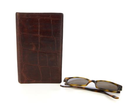 A pair of Gucci sunglasses and a Mulberry wallet, the sunglasses featuring brown tinted rectangular shaped lenses, and imitat