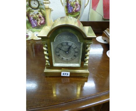 BRASS CASED CHIMING MANTLE CLOCK WITH PARIS MOVEMENT WITH SILVER MATT DIAL 20CM HIGH