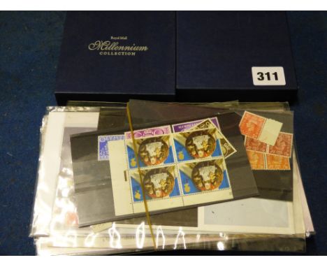 QUANTITY OF POSTAGE STAMP FIRST DAY COVERS AND TWO ROYAL MAIL MILLENIUM COLLECTION GUIDES 