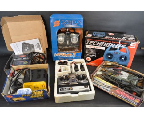 A Large Collection of R/C Parts and Accessories, to include receivers, body shells and two Aston Martin R/C models  