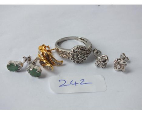 Three pairs of silver earrings and a ring    