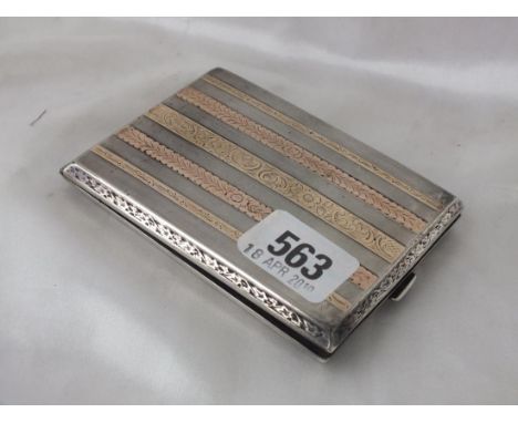 Cigarette case with two colour yellow metal decoration,  4" wide apparently unmarked 125g.     