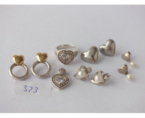 Silver heart ring and some silver earrings    