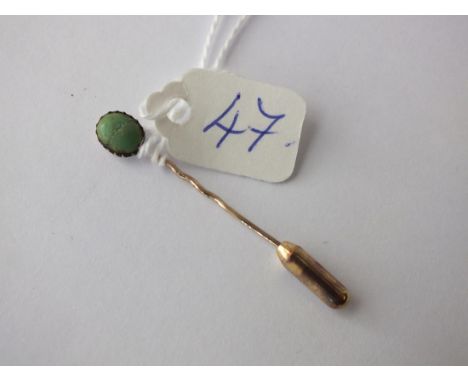 Green stone gold stick pin      