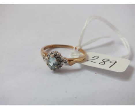 9ct diamond and aqua oval cluster ring, size N.    