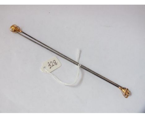 Pair of gold mounted stick pins, signed by   “Charles Horner”.         