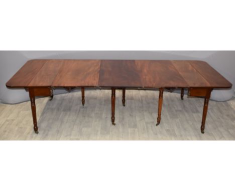 Regency 19thC Wilkinson patent type mahogany extending dining table with three extra leaves in the style of&nbsp;Gillows, rai