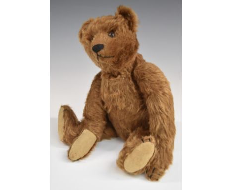 Steiff Teddy bear with growler, cinnamon mohair, straw filling, disc joints, stitched features and button to ear, 32cm tall.&