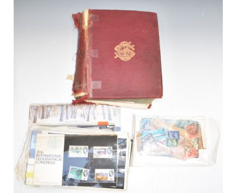 The Strand stamp album containing a world stamp collection along with GB first day covers and presentation packs including th