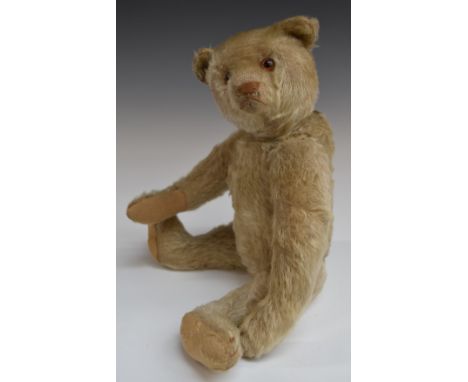 Steiff Teddy bear with blonde mohair, shaved snout, straw filling, disc joints and stitched features, 32cm tall.&nbsp;