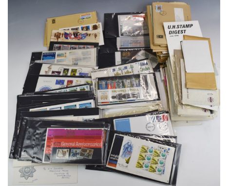 An accumulation of GB and Channel Islands stamps, presentation packs and first day covers, decimal and pre-decimal many still