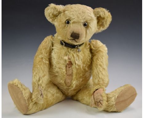 Farnell Teddy bear&nbsp;with blonde mohair, shaved snout, part straw filling, disc joints, cloth pads and stitched features, 