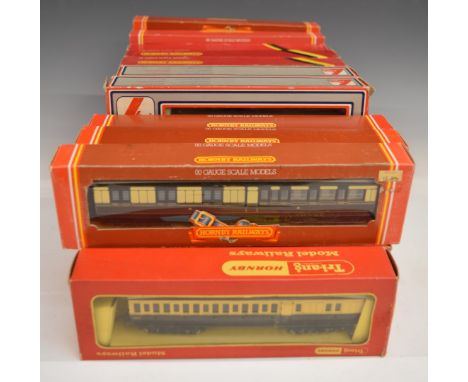 Twenty-two Hornby, Airfix, Lima, Mainline and similar 00 gauge model railway coaches, all in original boxes.&nbsp;